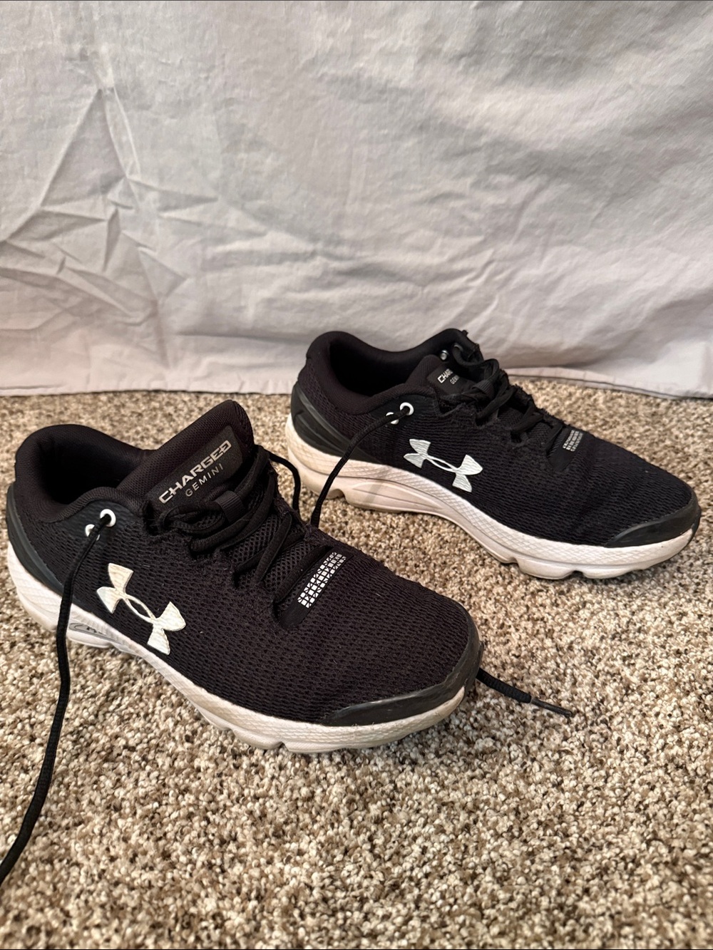 Under Armour Black & White Youth Charged Cushioning Athletic Shoes